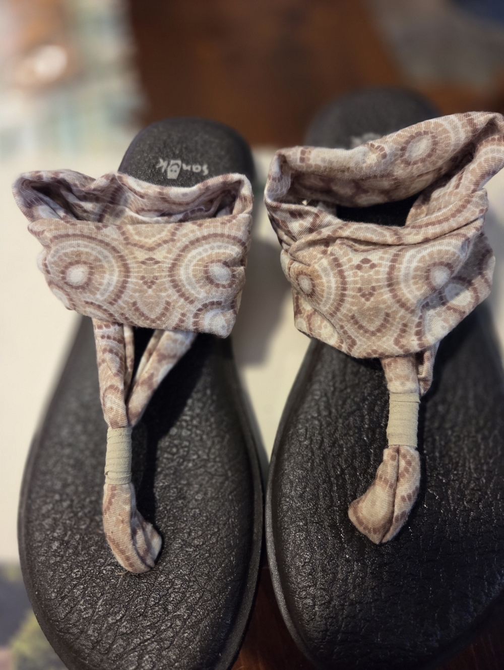 Sanuk Women’s Black Footbed Sandals with Beige Patterned Wrap Straps